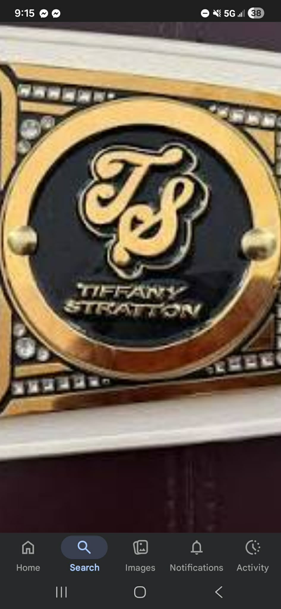 Women's international belt with AJ Lee side plates 4mm and the Women's united states belt Tiffany Stratton side plates. 4mm