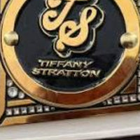 Women's international belt with AJ Lee side plates 4mm and the Women's united states belt Tiffany Stratton side plates. 4mm